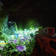 A bunch of shiny space crystals lay on the floor of a cave in Destiny 1.